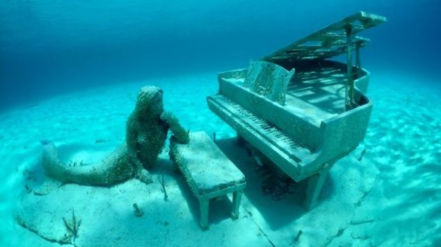 mermaid underwater piano